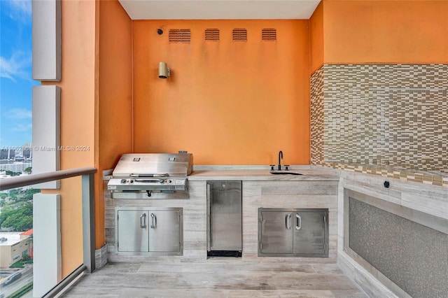 interior space featuring light hardwood / wood-style floors and sink