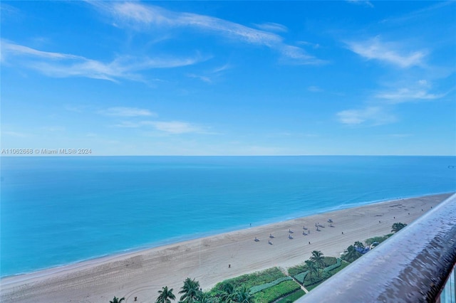 view of water feature with a beach view