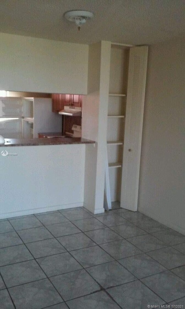 kitchen with tile patterned flooring