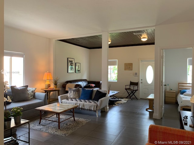 living room featuring wood ceiling