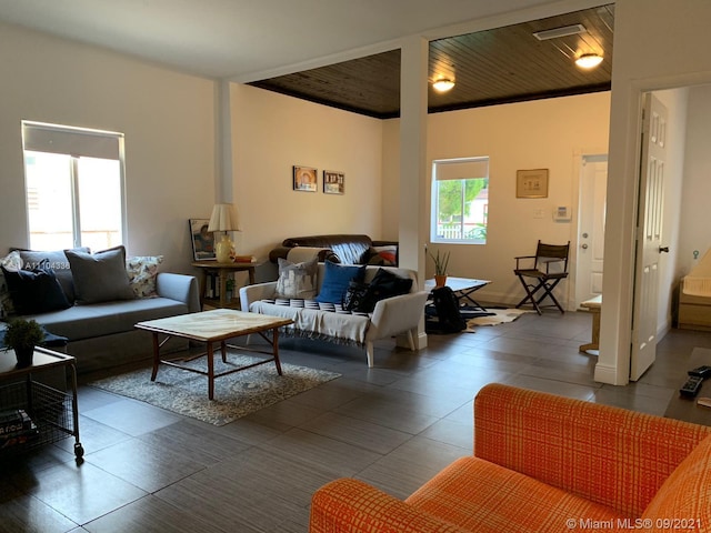 living room featuring wood ceiling