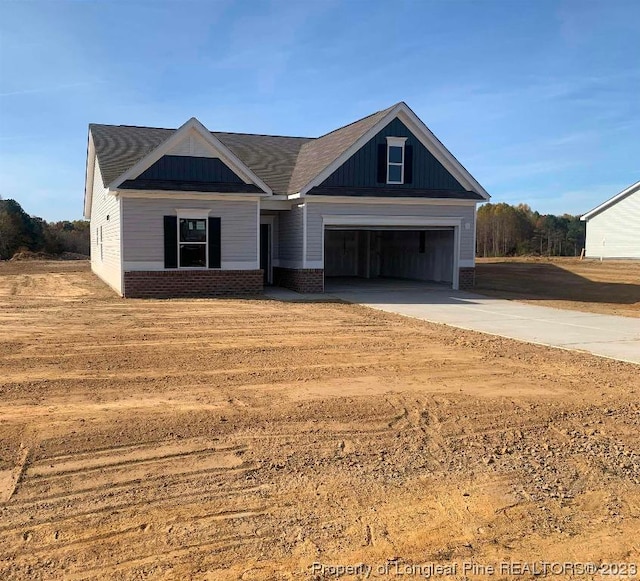 view of front of home with a garage