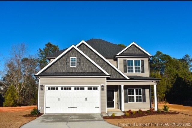 craftsman house with a garage