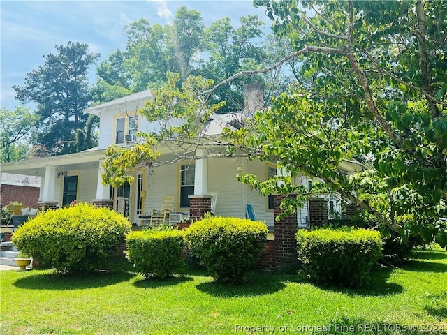 view of property exterior featuring a yard