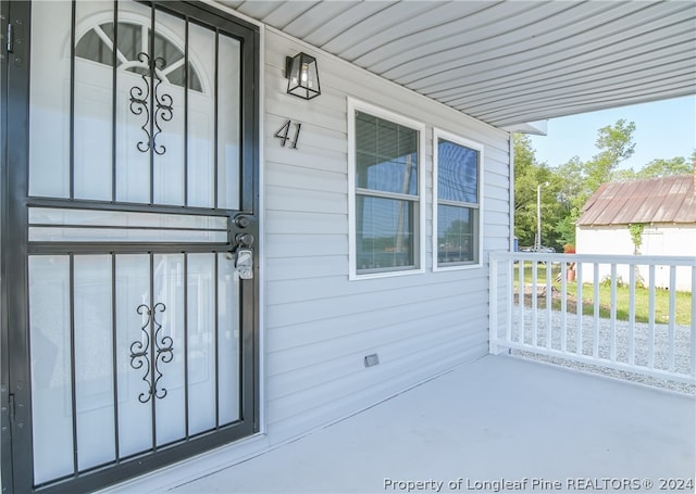 property entrance with a porch