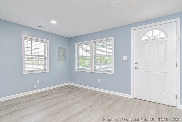 entrance foyer with light hardwood / wood-style floors