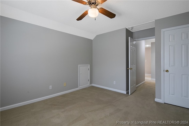 unfurnished bedroom featuring ceiling fan and carpet floors