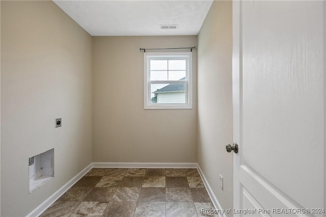 laundry room featuring hookup for an electric dryer