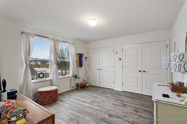 sitting room with hardwood / wood-style floors