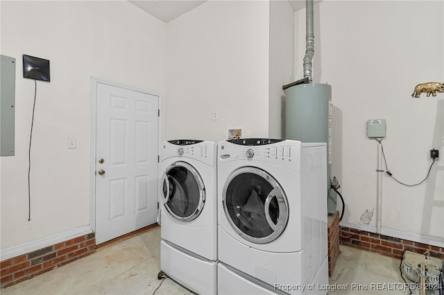 washroom featuring washing machine and clothes dryer