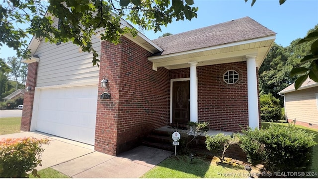 single story home with a garage