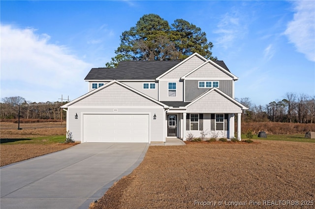 craftsman-style home with a garage and a front lawn