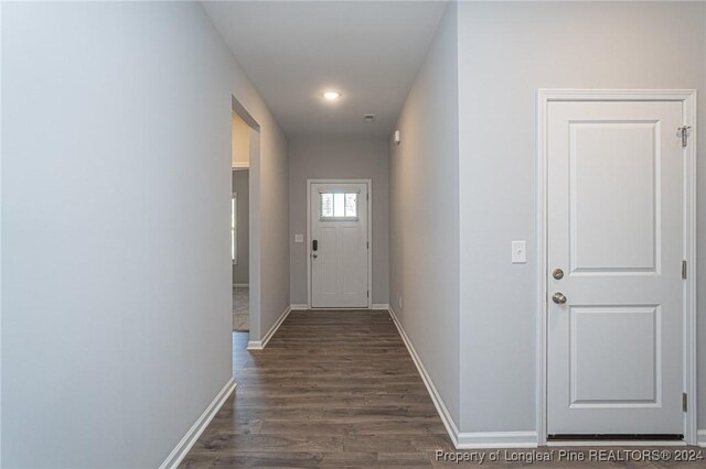 hall featuring dark hardwood / wood-style floors