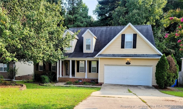 view of front facade featuring a front yard and a garage