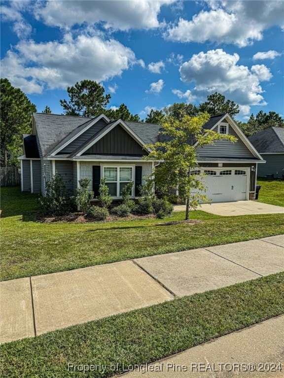 craftsman-style home with a front lawn