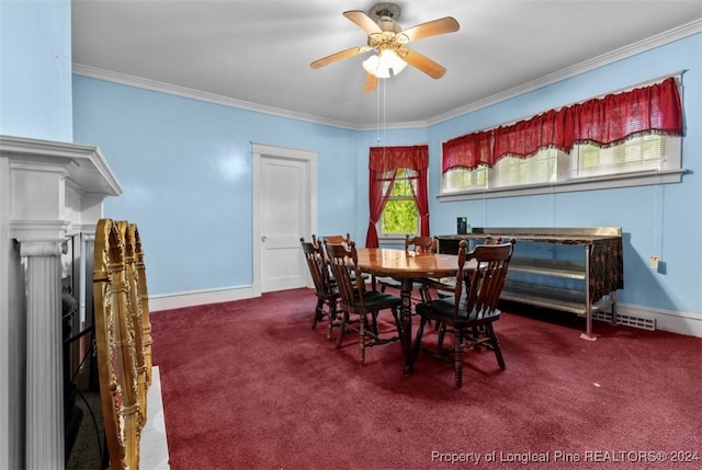 dining area featuring ceiling fan, carpet floors, a healthy amount of sunlight, and crown molding