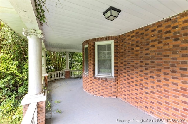 view of patio featuring a porch