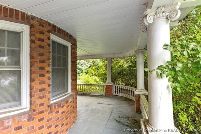 view of patio featuring a porch