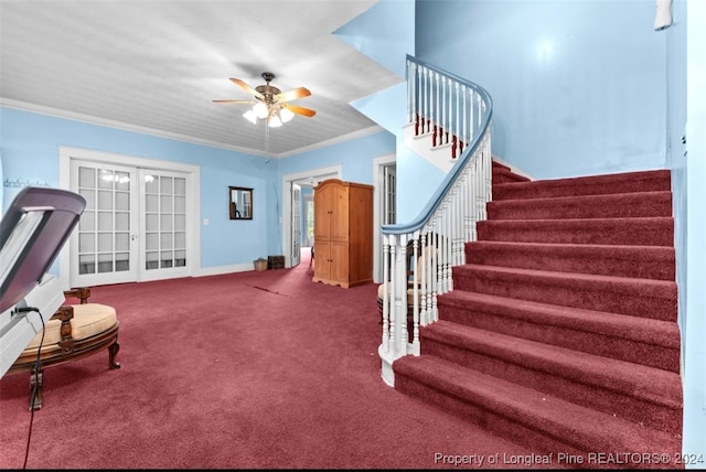 interior space with crown molding, carpet, ceiling fan, and french doors