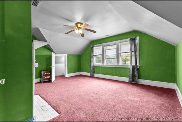 bonus room featuring ceiling fan, carpet floors, and lofted ceiling