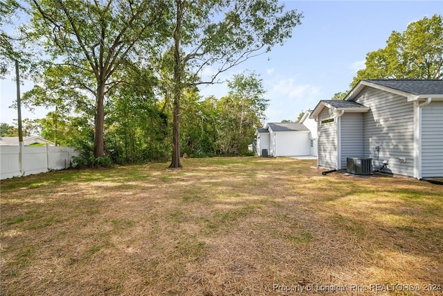 view of yard featuring central AC