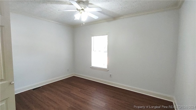 spare room featuring crown molding, a textured ceiling, ceiling fan, and dark hardwood / wood-style floors