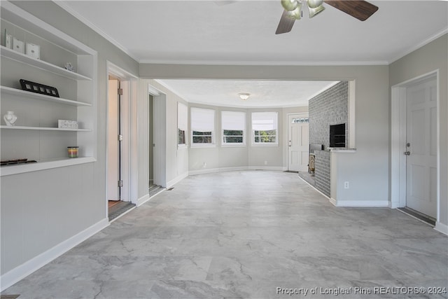 hallway with built in shelves and crown molding