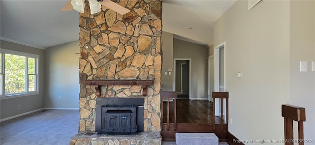 unfurnished living room with ceiling fan, lofted ceiling, crown molding, and carpet floors