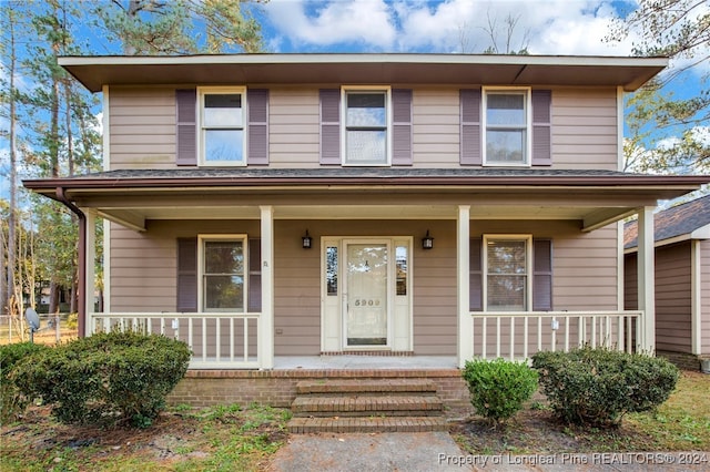 view of front of home featuring a porch