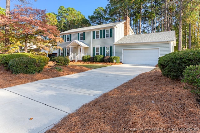 colonial-style house with a garage