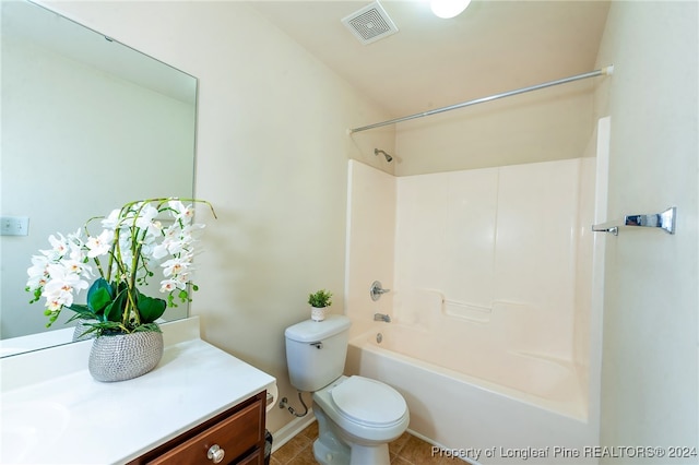 full bathroom featuring tile patterned floors, vanity, shower / bathtub combination, and toilet