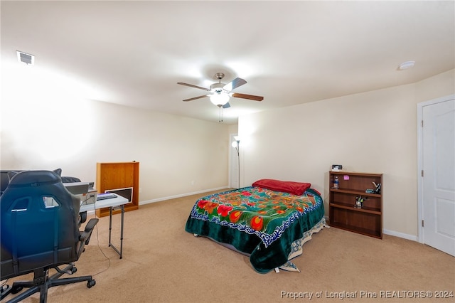 carpeted bedroom featuring ceiling fan