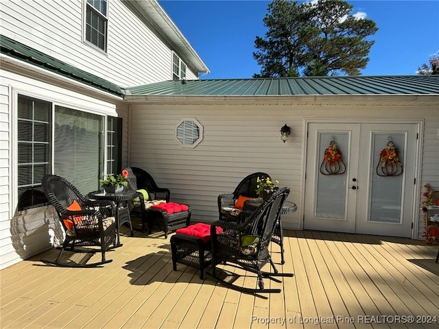 wooden deck featuring outdoor lounge area