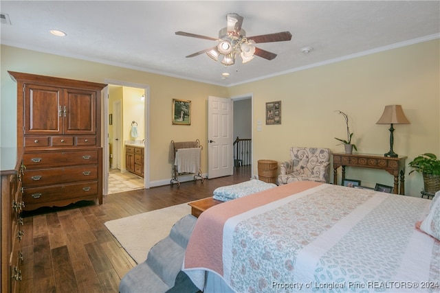 bedroom with hardwood / wood-style flooring, ceiling fan, crown molding, and ensuite bathroom