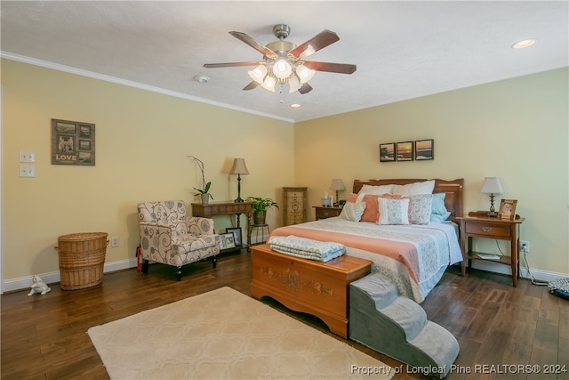 bedroom featuring ceiling fan, crown molding, and dark wood-type flooring