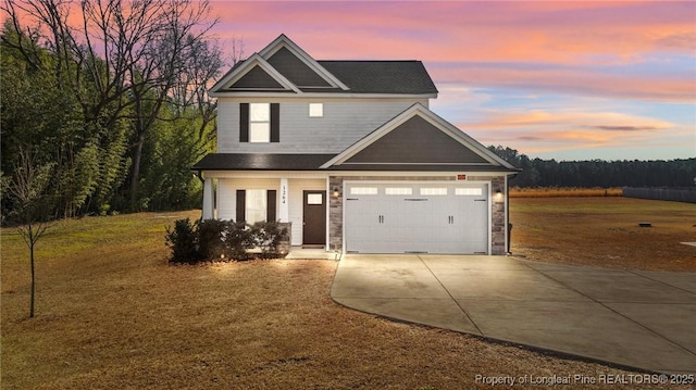 craftsman inspired home featuring a yard