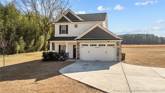 craftsman house with a garage