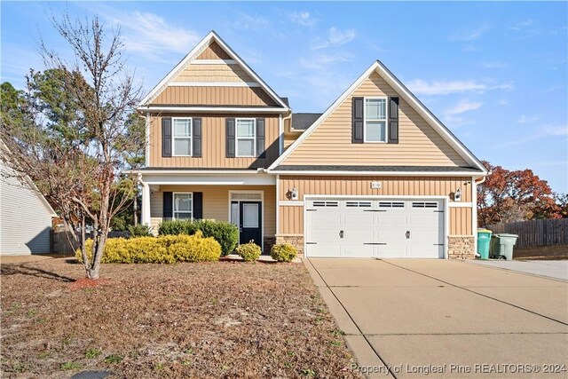 craftsman-style home with a garage