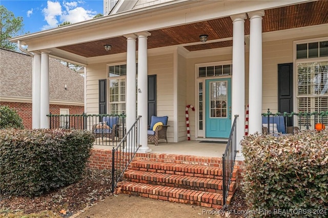 entrance to property with covered porch