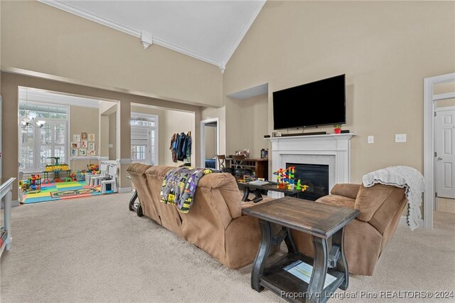 living room featuring light carpet, high vaulted ceiling, and crown molding