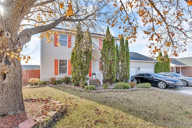 view of front facade with a front yard