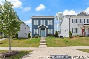 view of front of home featuring a front lawn