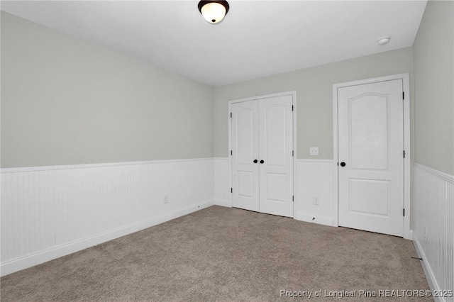 unfurnished bedroom with carpet