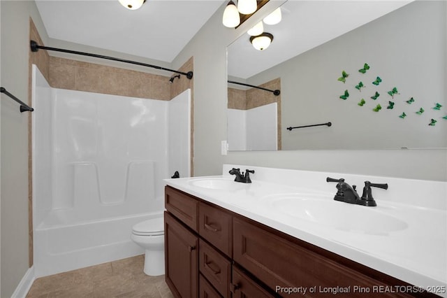 full bathroom featuring tile patterned flooring, vanity, toilet, and tub / shower combination