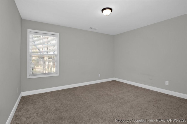 empty room featuring carpet