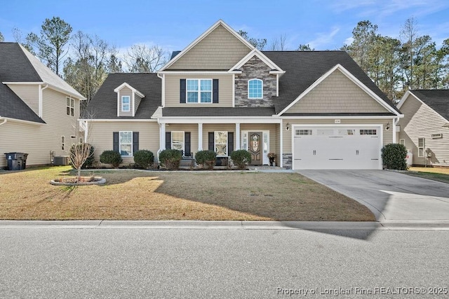 view of front of house with a front lawn and central air condition unit