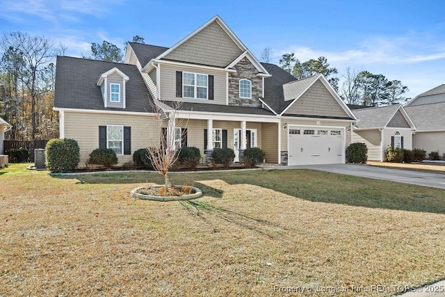 view of front of home featuring central AC unit and a front lawn