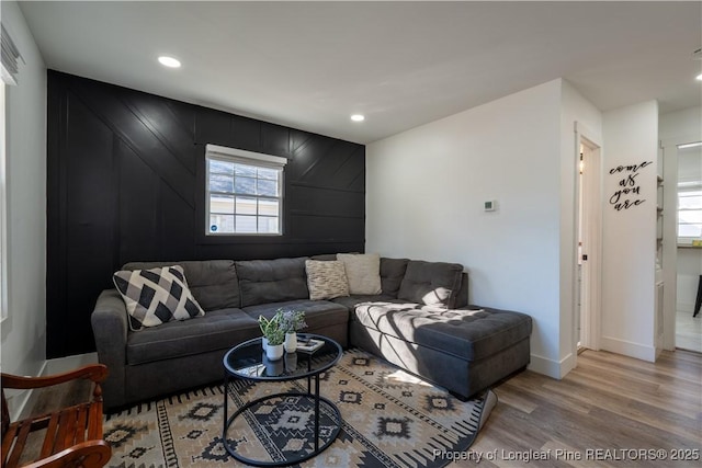 living room with light hardwood / wood-style floors