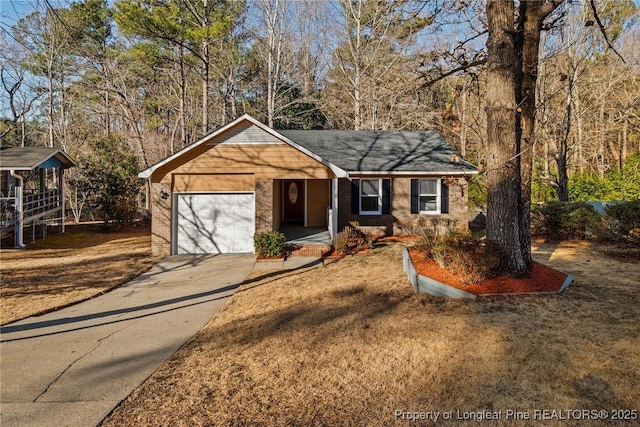 view of front of property with a garage