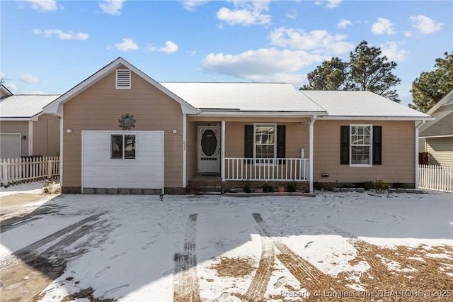 ranch-style house featuring covered porch